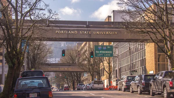 Portland State University sign on walkway over road