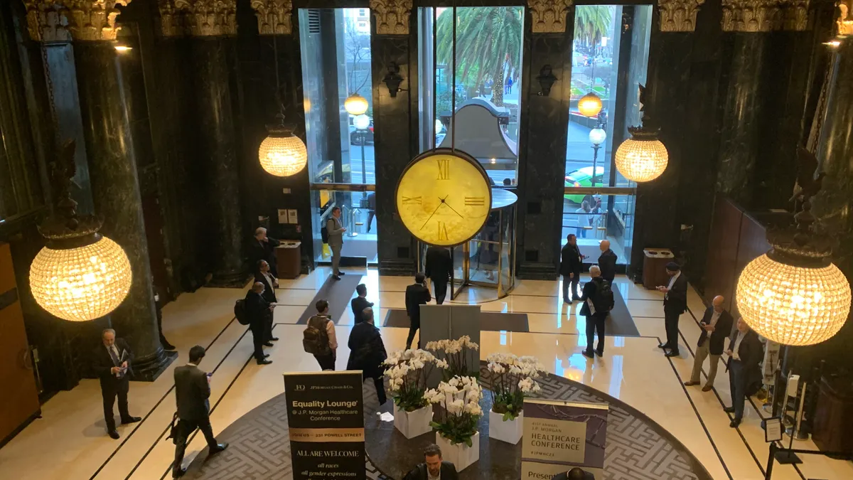 People walk through the lobby of the Westin St. Francis in San Francisco on Jan. 10, 2023