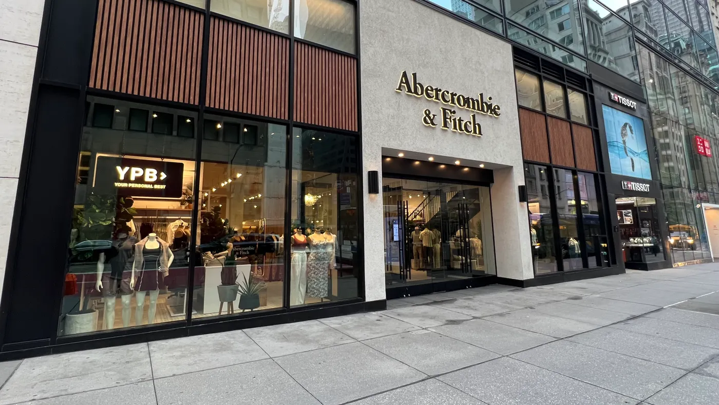 A closing store on a city block.