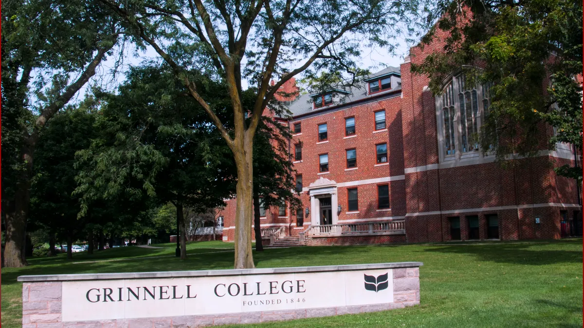 A sign advertises Grinnell College.