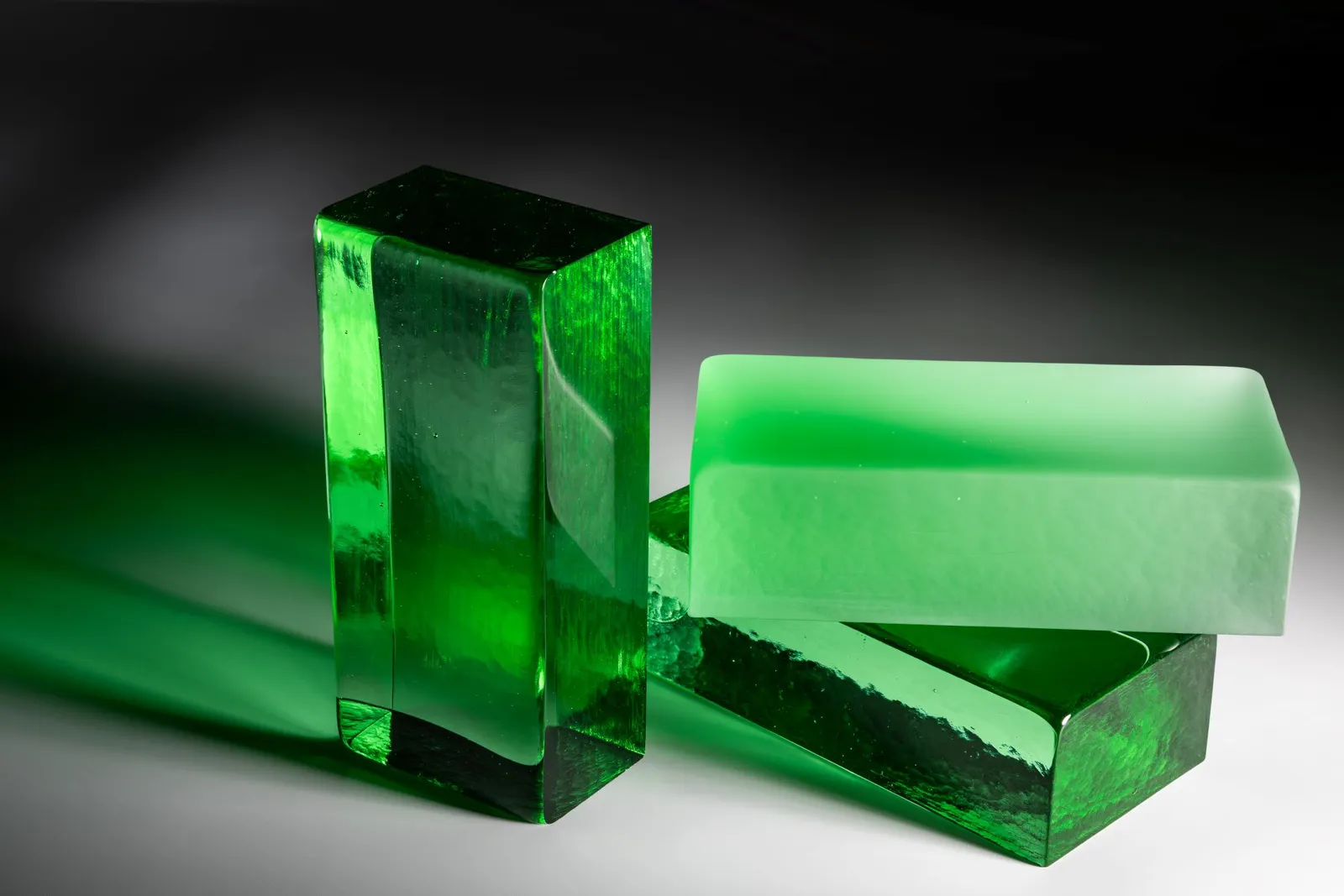 A pile of green glass bricks.