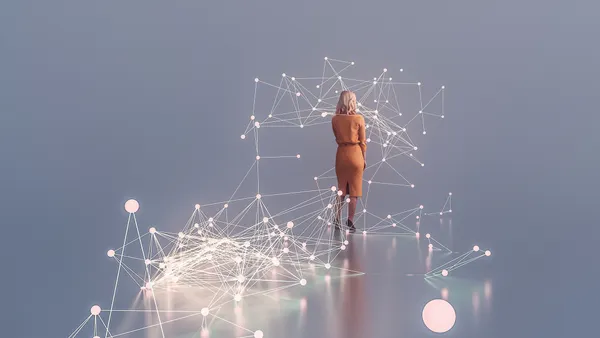 Businesswoman entangled in complex data and graphs