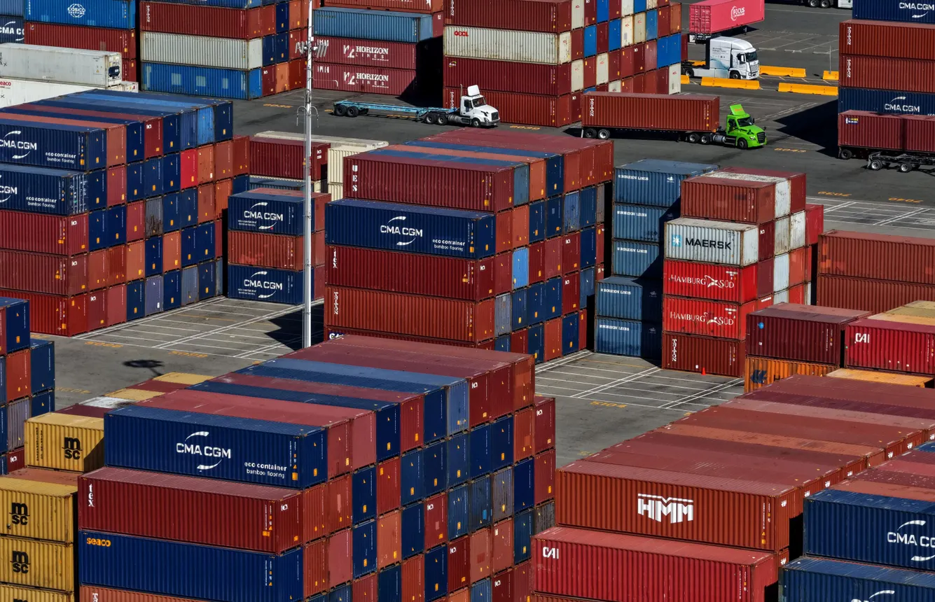 Shipping containers sit stacked at the Port of Oakland on Oct. 10, 2025, in Oakland, California.