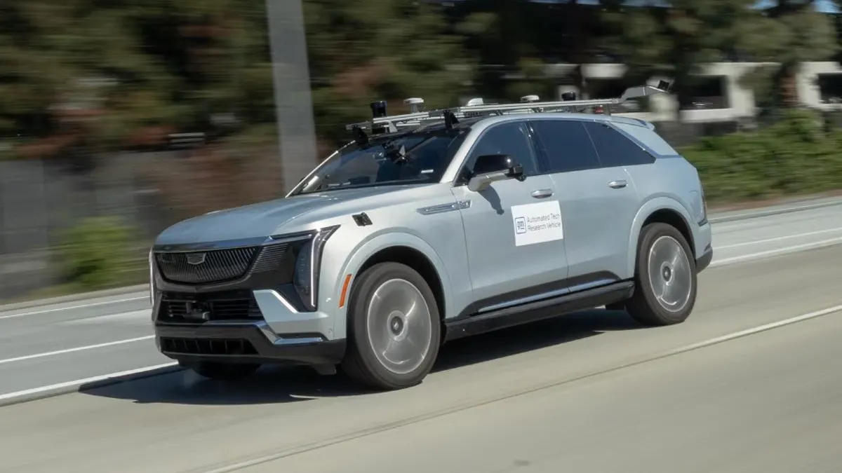 A Cadillac Escalade IQ electric SUV outfitted with sensor and other hardware to test the automaker's driving technology.