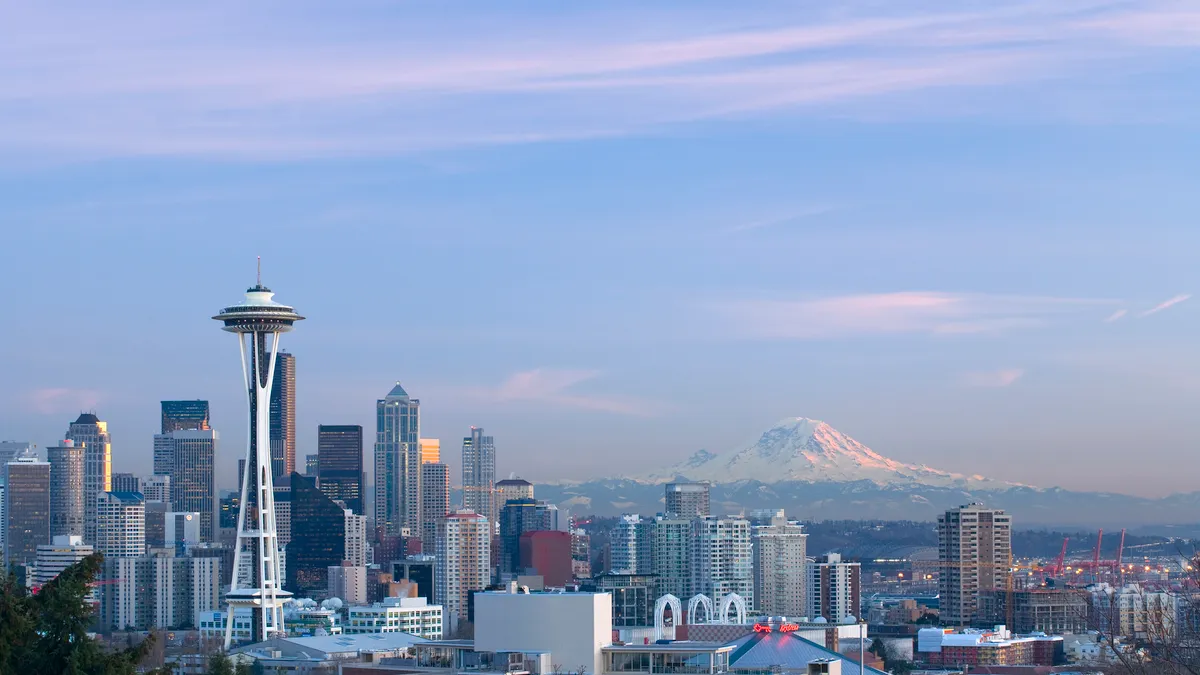 Seattle USA, Washington State, Seattle skyline and Mount Rainier - stock photo