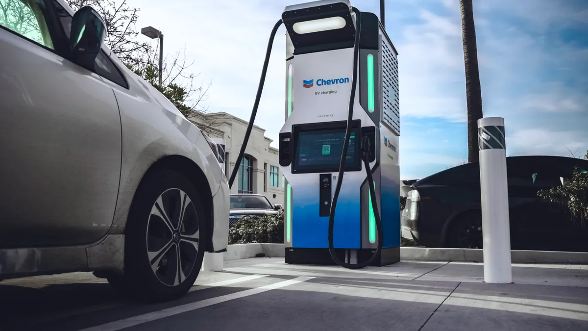 A photo of a FreeWire EV charging station in a parking lot.