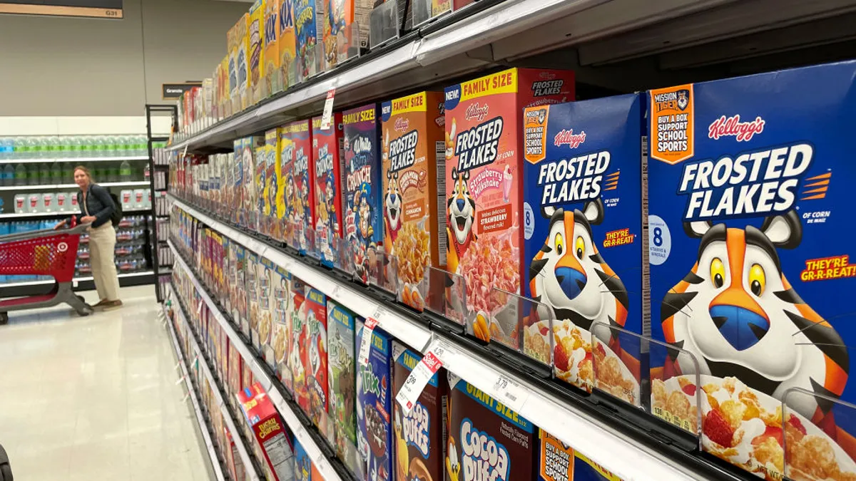 Boxes of cereal are displayed on a shelf