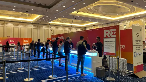 Attendees check in at the RE+ conference.