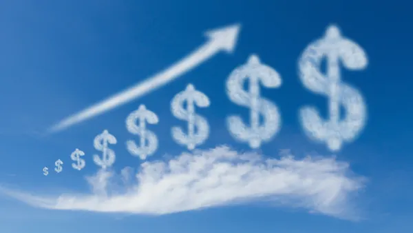 Growth business, cloud dollar sign grow up on blue sky.