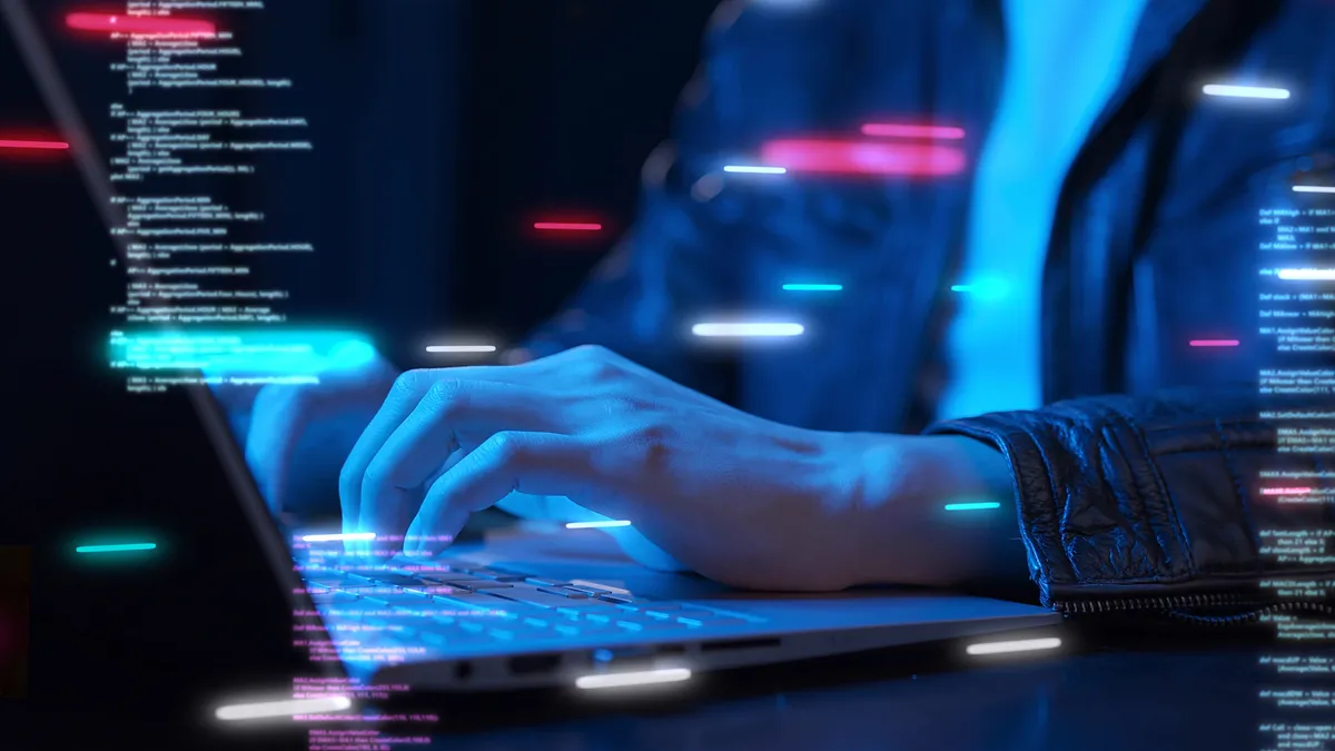 a graphic showing hands typing in a keyboard