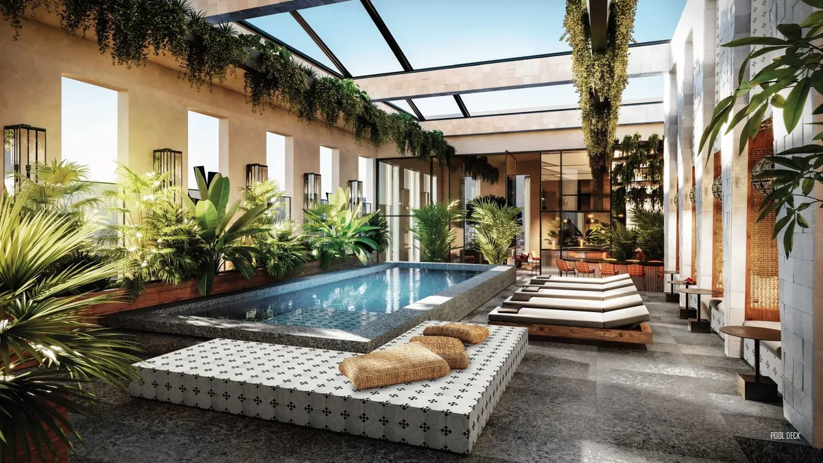 A rendering of a rooftop pool surrounded by lounge chairs.