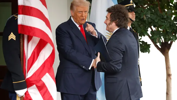 U.S. President Donald Trump shakes hands with Argentina President Javier Milei at the White House on Oct. 14, 2025, in Washington, D.C.