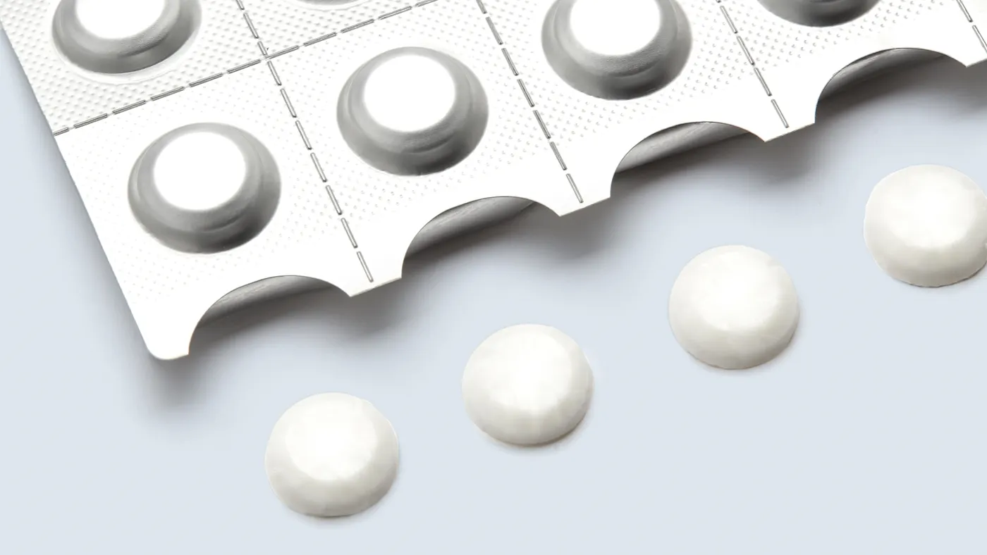 A graphic of medication in a tablet case.