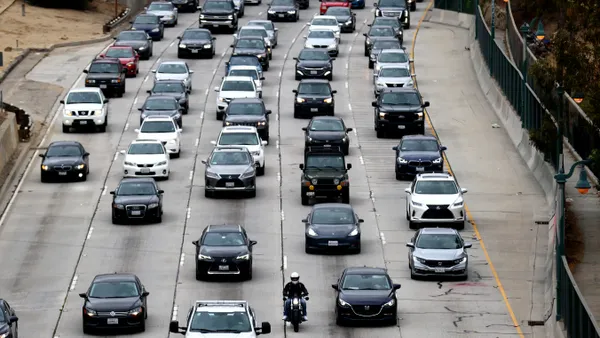 Vehicles crowd a five-lane highway in Los Angeles.