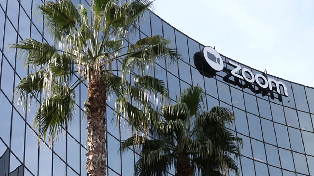 A sign is posted on the exterior of Zoom headquarters on February 07, 2023 in San Jose, California.