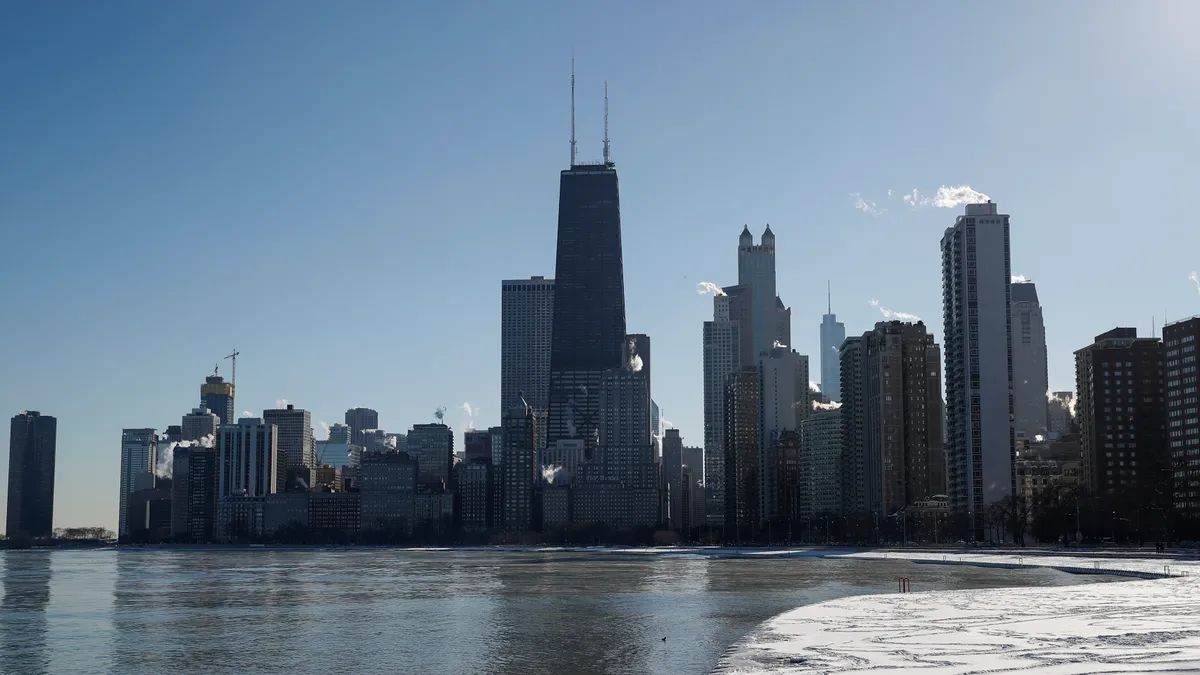 Smoke rises from the skyscrapers along Chicago's lakefront.