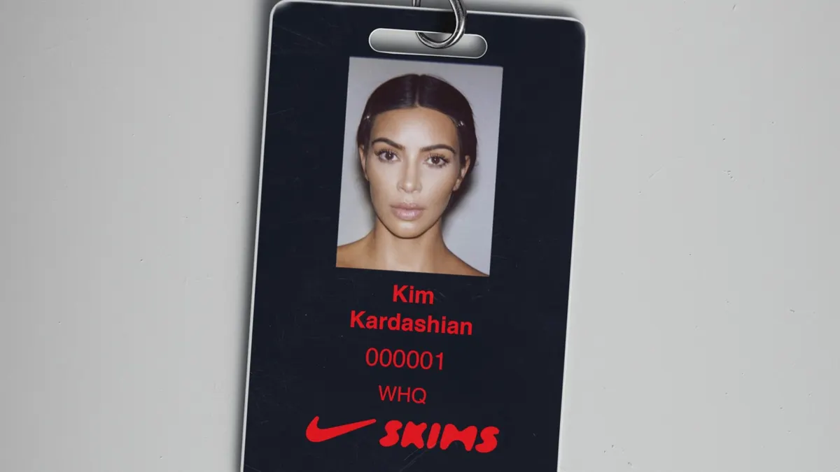A Nike employee badge featuring Kim Kardashian.