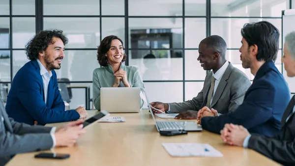 Group of business persons in business meeting