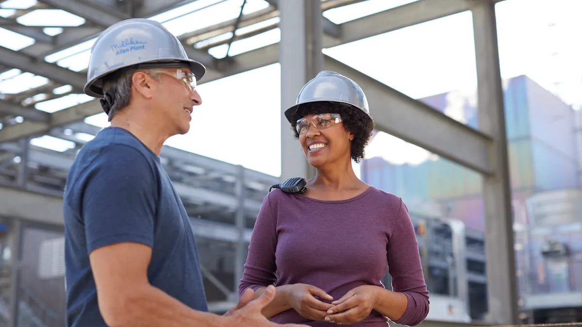 Team members covening at work site.