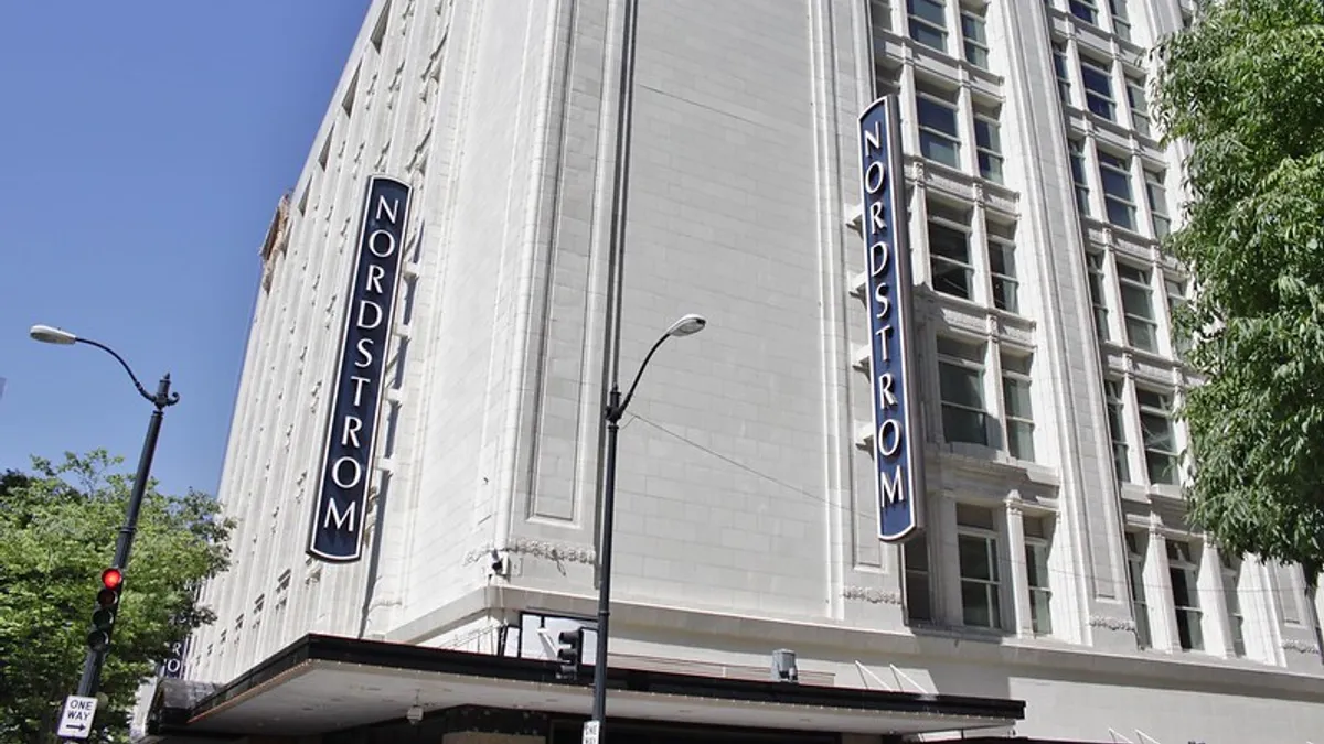 Exterior shot of Nordstrom with Nordstrom sign.