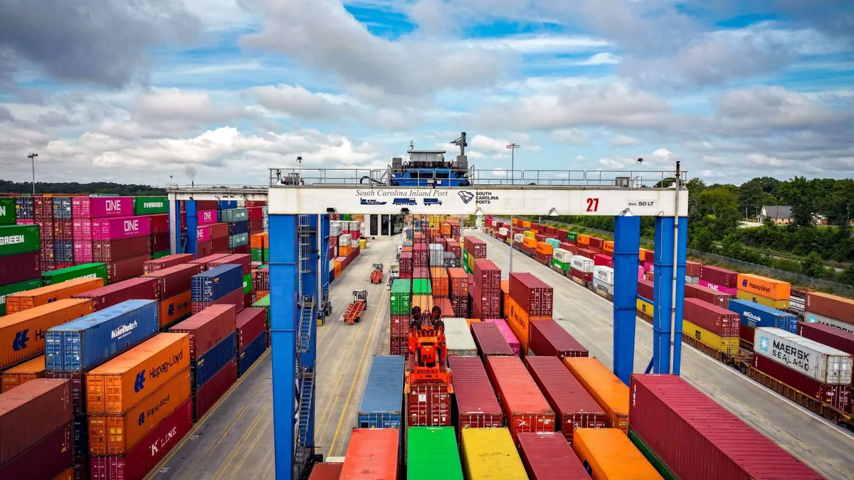 A photo showing containers stacked inside an inland port in South Carolina.