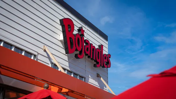 A zoomed in image of a white store with a red Bojangles logo.