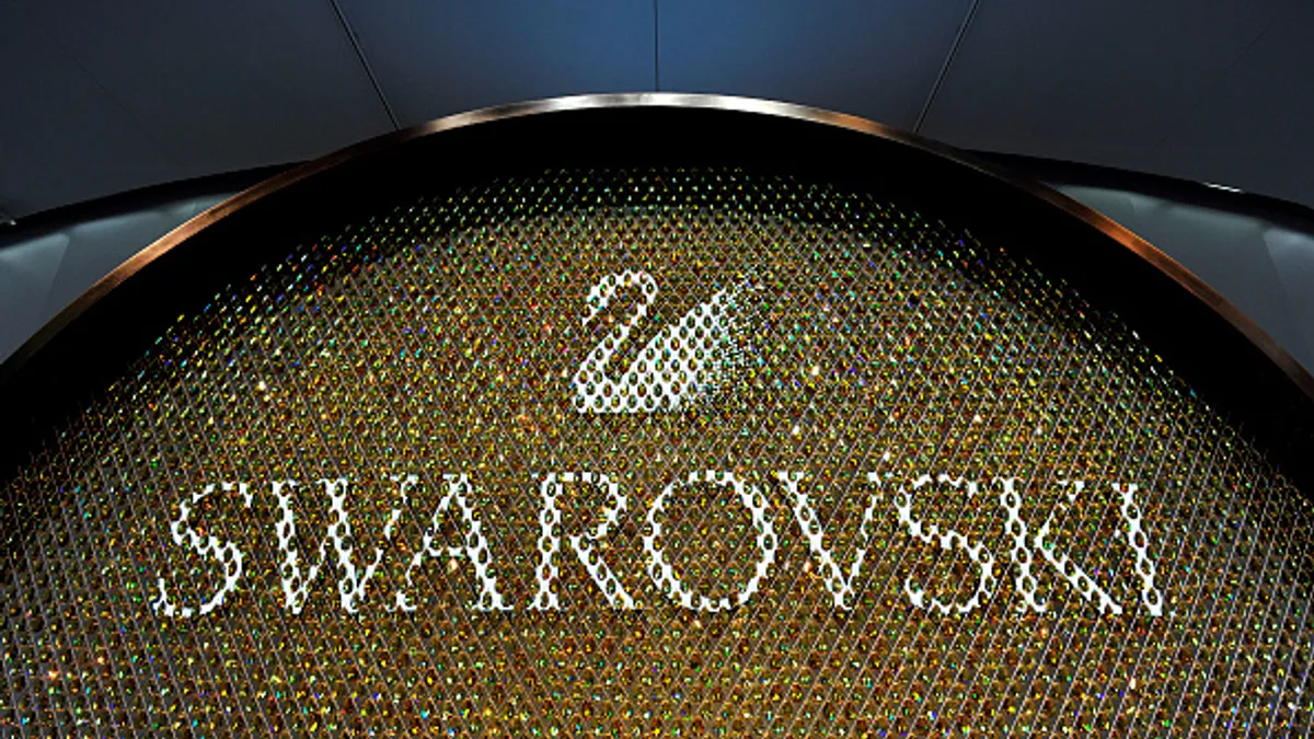 A Swarovski logo is displayed during Baselworld on March 16, 2016.