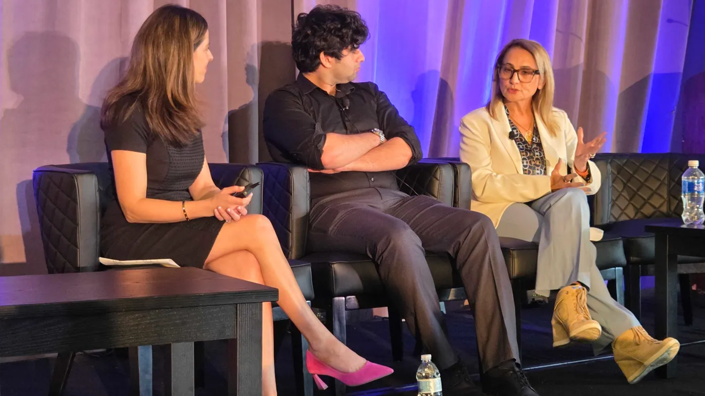three panelists in business attire