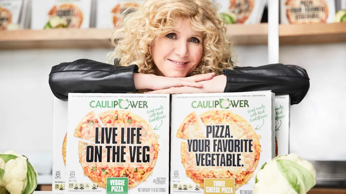 Caulipower founder and CEO Gail Becker and some of her company's frozen pizzas.