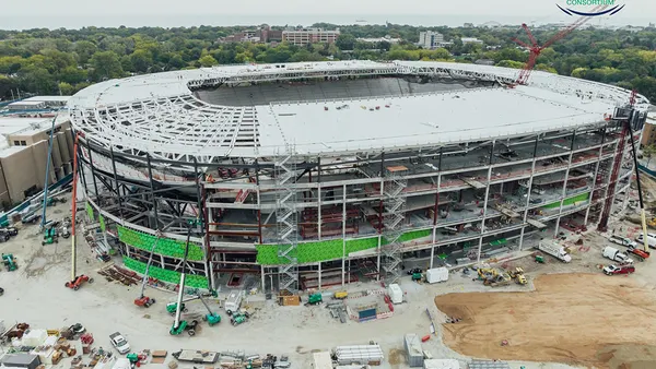 An aerial view of a stadium under construction.