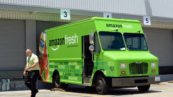A truck outside a warehouse.