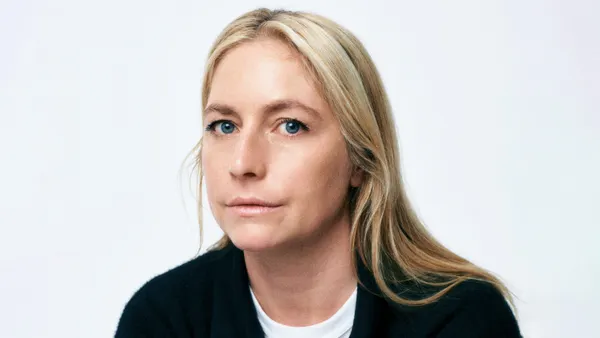 Meryll Rogge in a professional headshot.