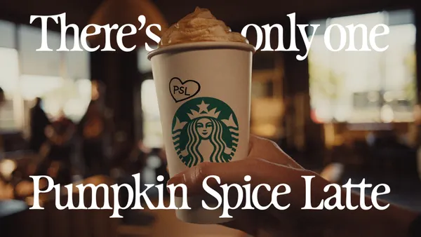A cup of Starbucks Pumpkin Spice Latte is held up in front of overlay text that reads: "There's Only One Pumpkin Spice Latte"