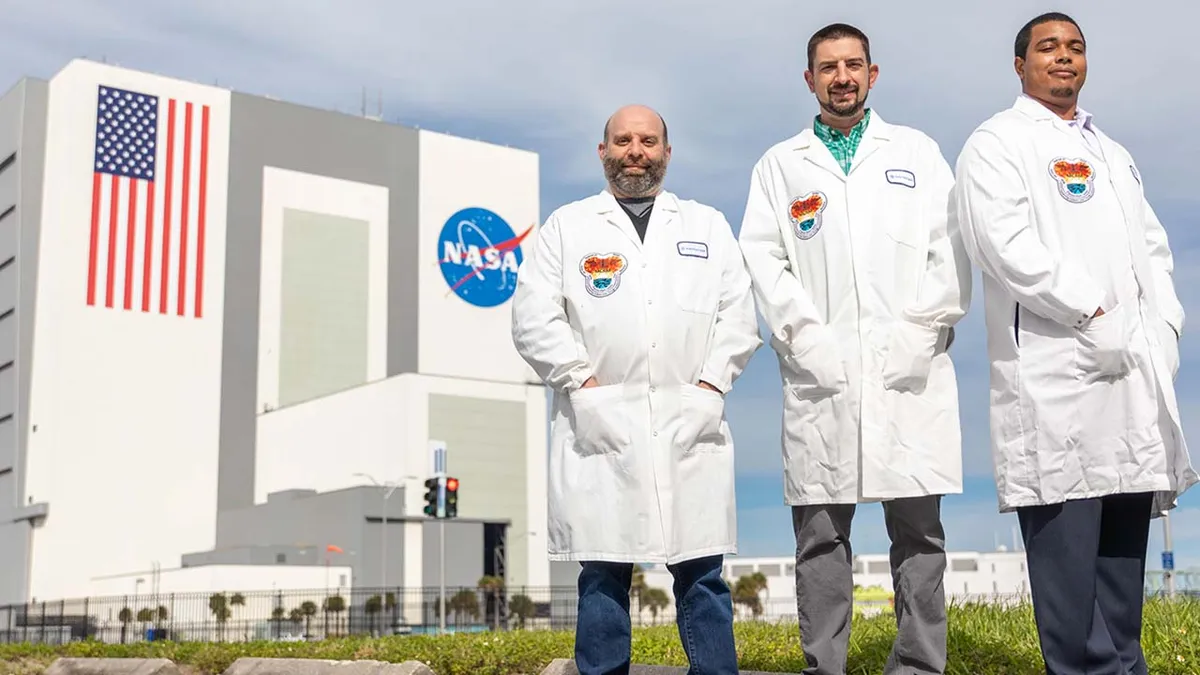 Bristol Myers Squibb researchers Matt Pokross, Robert Garmise, and Michael Little at Kennedy Space Center.