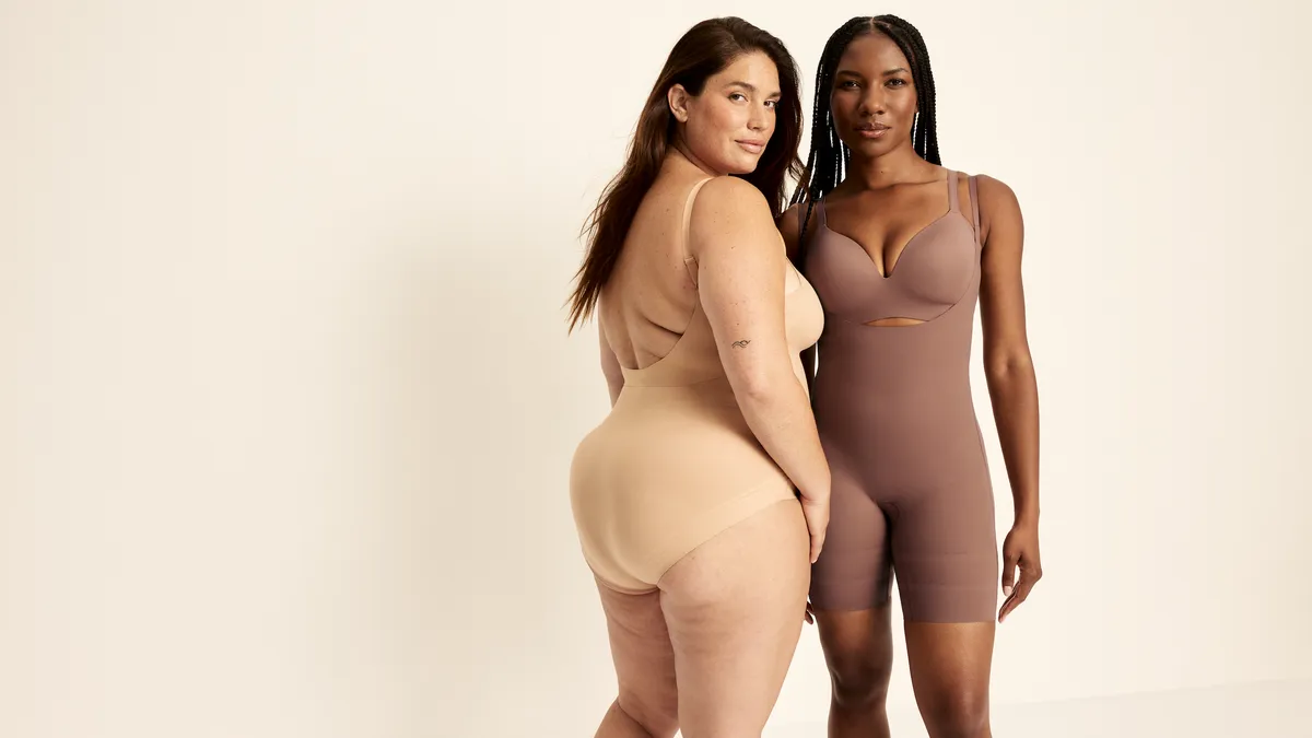 Two people wearing shapewear from Knix's customizable collection.