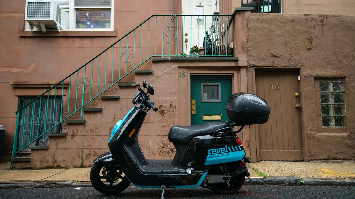 A Revel brand moped parked on a residential street, June 18, 2019, in Brooklyn, New York.