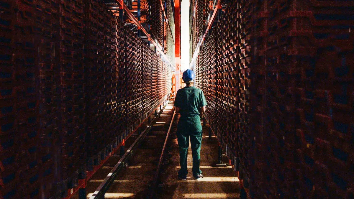 A worker in one of Ynsect's insect farms.