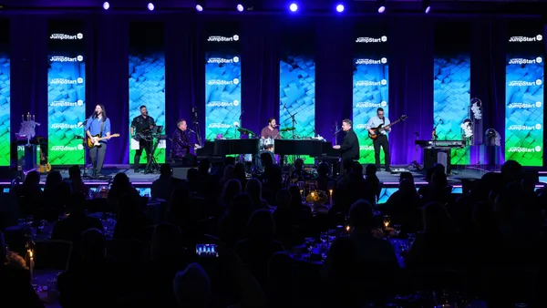 Face 2 Face, a Billy Joel and Elton John cover band, performs at the SMC3 Jump Start 2025 conference in Atlanta on Tuesday, Jan. 28, 2025.