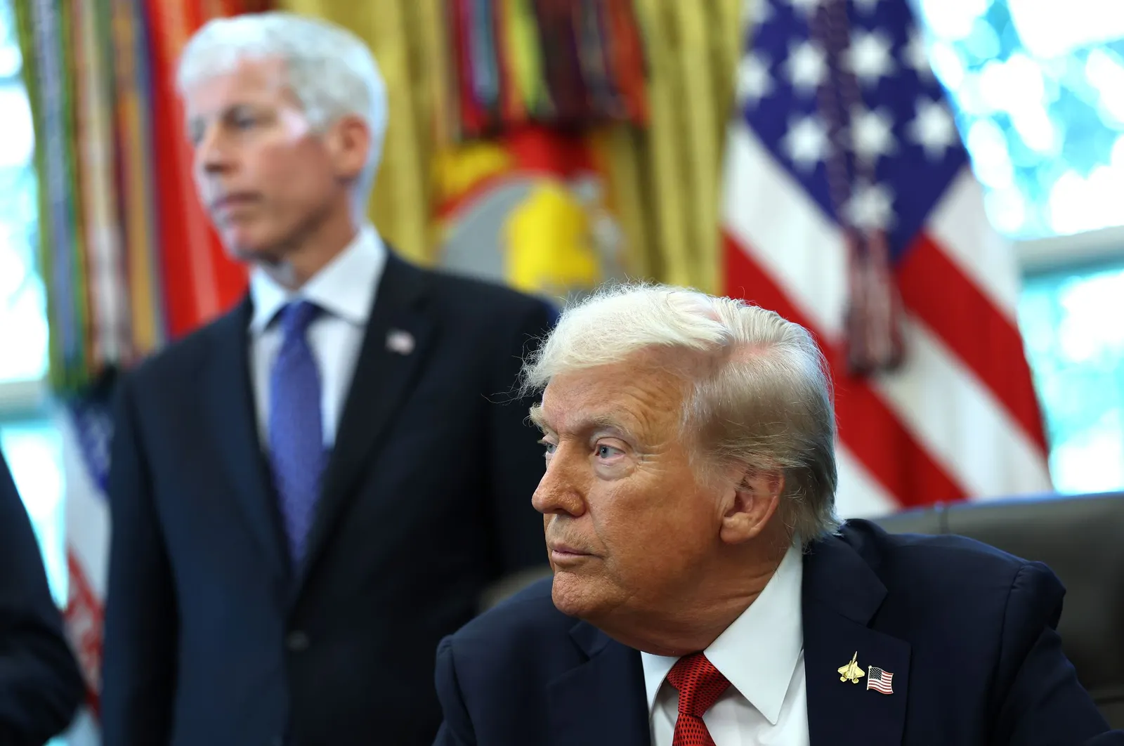 President Donald Trump, joined by Energy Secretary Chris Wright, speaks during an event in the Oval Office at the White House.