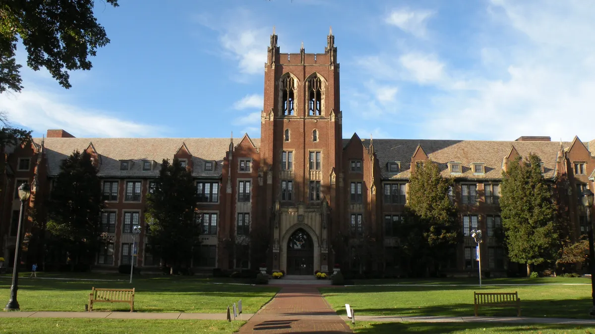 A view of the south side of the Notre Dame College Administration Building, including its tower, taken from the campus quad.