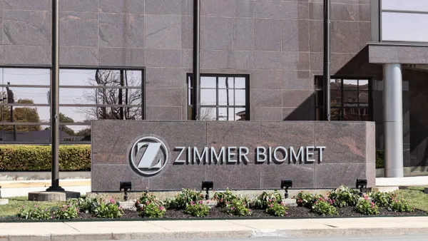 A sign for Zimmer Biomet is shown outside of the company's headquarters building.