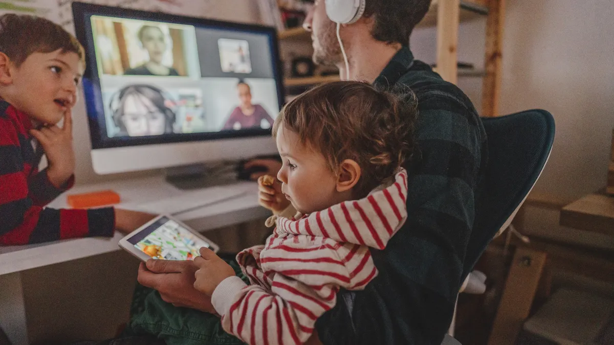 Man working from home with kids