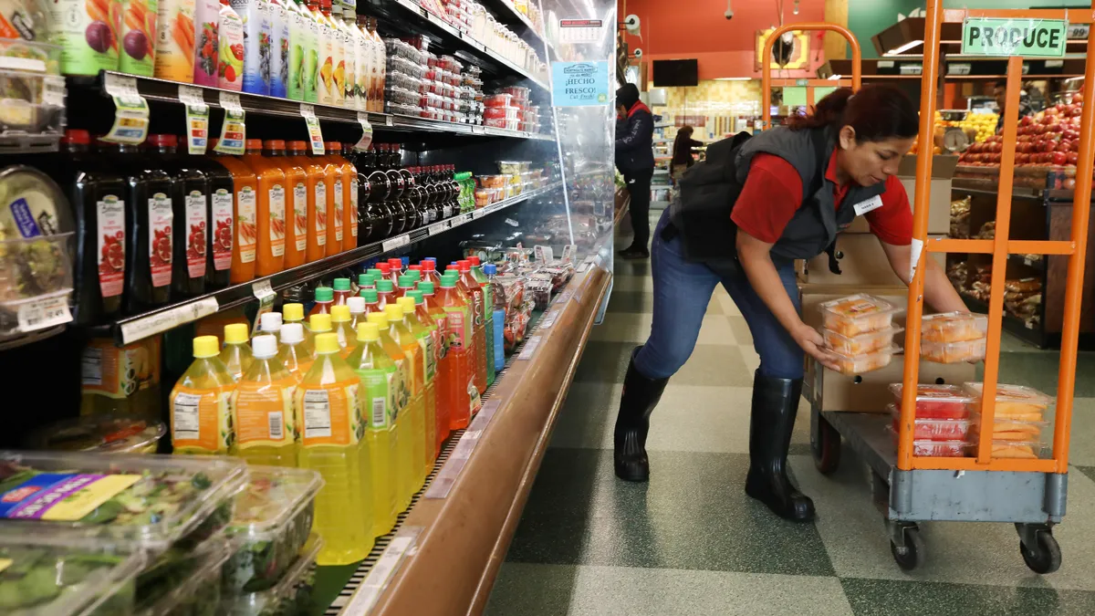 Grocery worker in supermarket