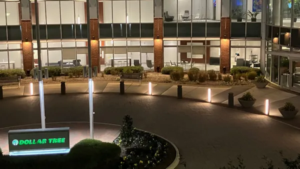 Dollar Tree's corporate headquarters building at dusk