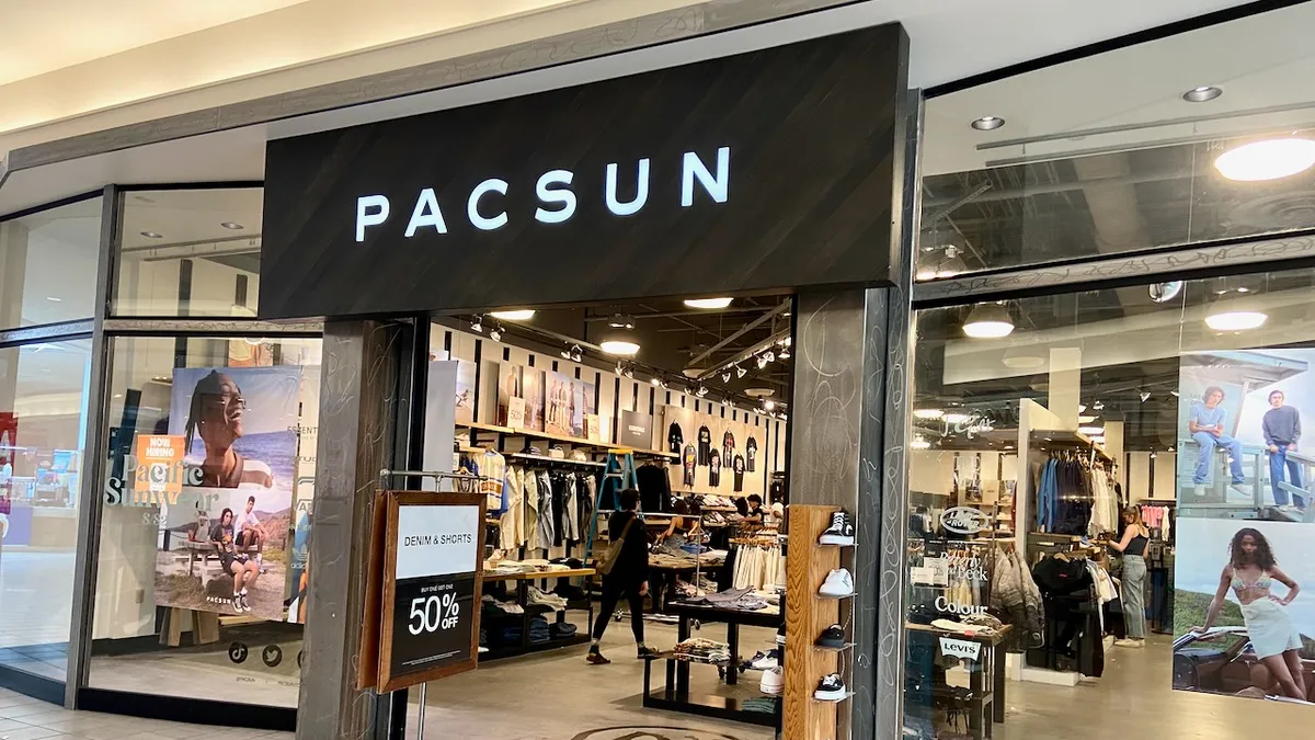 A mall entrance to a clothing store named "Pacsun."