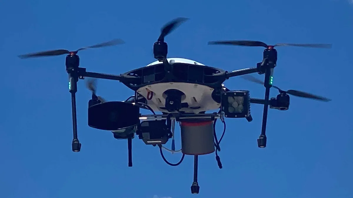 The Bond Air Guardian drone flying in the sky.