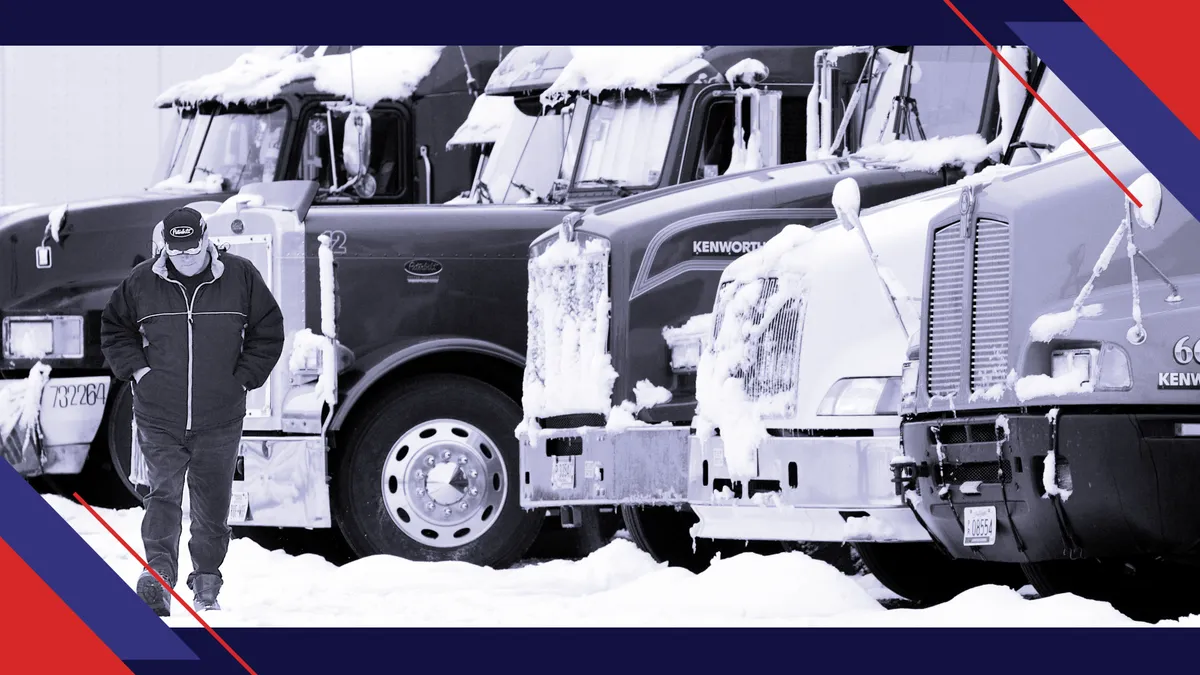 John Hart of Truro, Nova Scotia walks in front of a row of semi-trucks at the Broadway Fuel Stop March 29, 2007 in Hardin, Montana