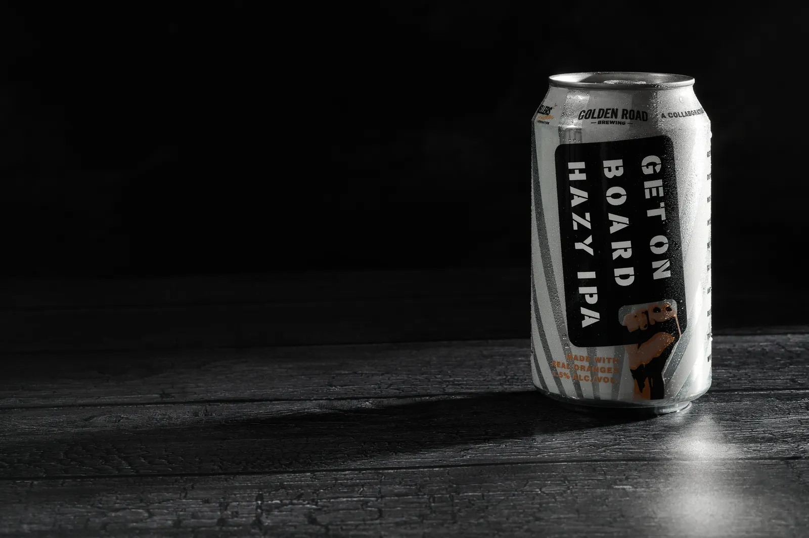 A can of Golden Road's Get on Board Hazy IPA.