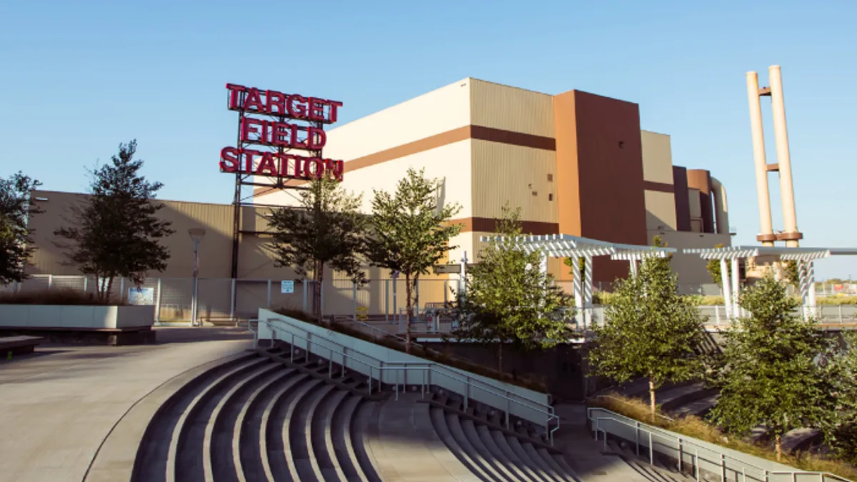 A sign that says "Target Field Station" in front of an industrial facility