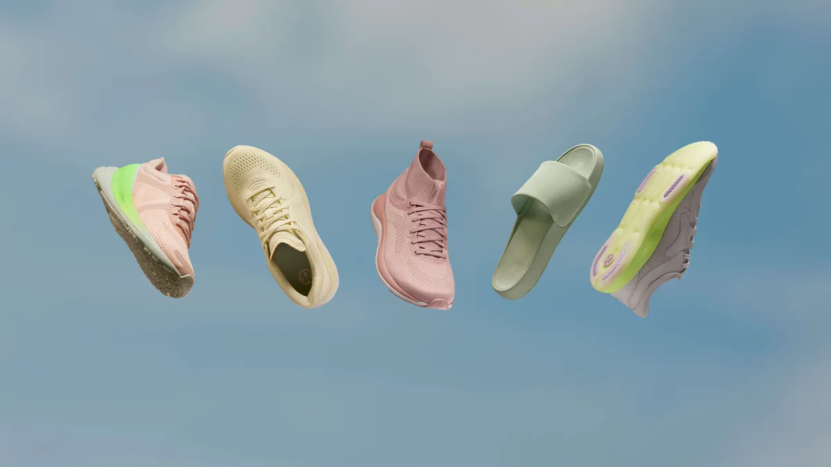 Five pastel-colored shoes, without their mates, float against a cloudy-sky background.